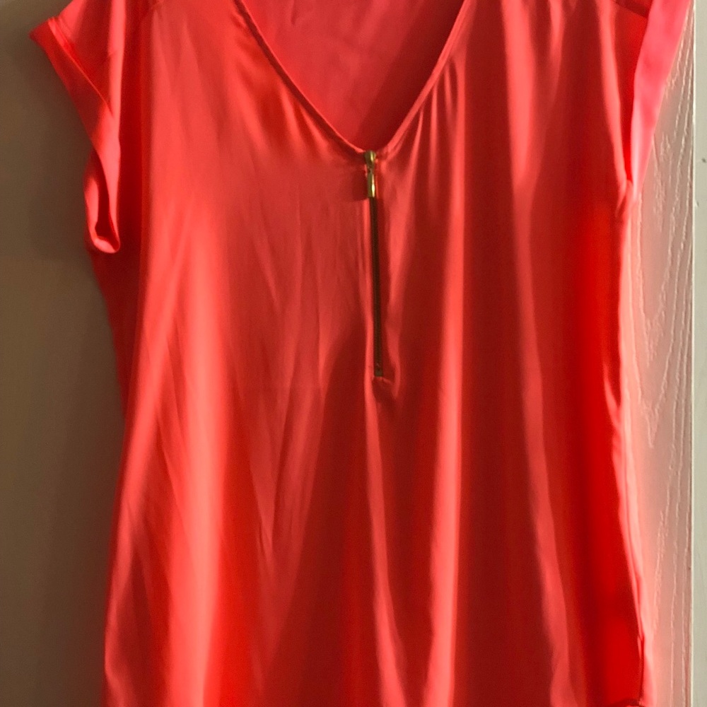 Bright peach blouse